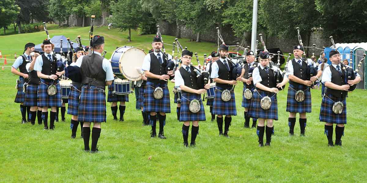 Bagpipe playing band in Scotland