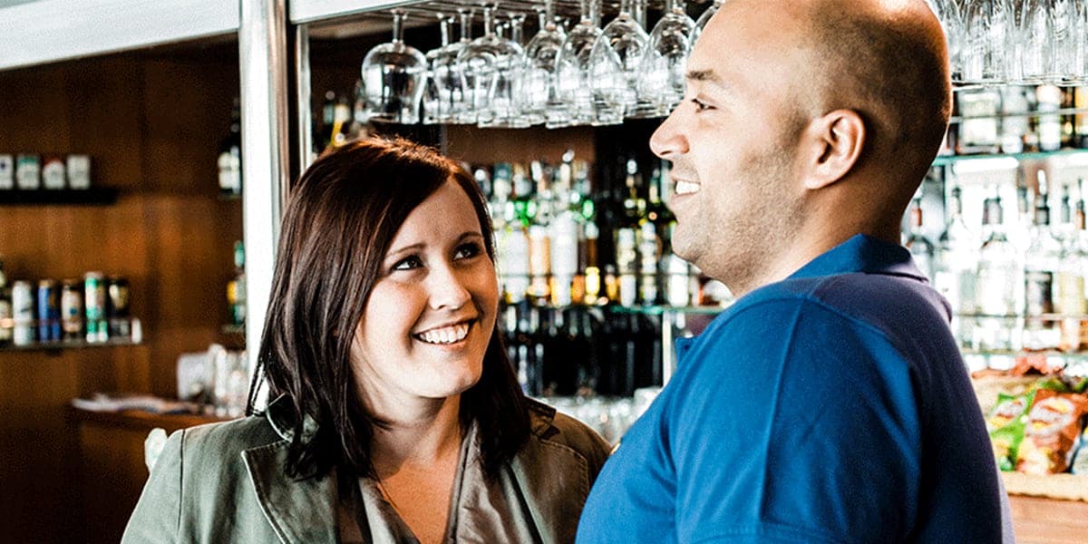 Couple at bar onboard Amsterdam