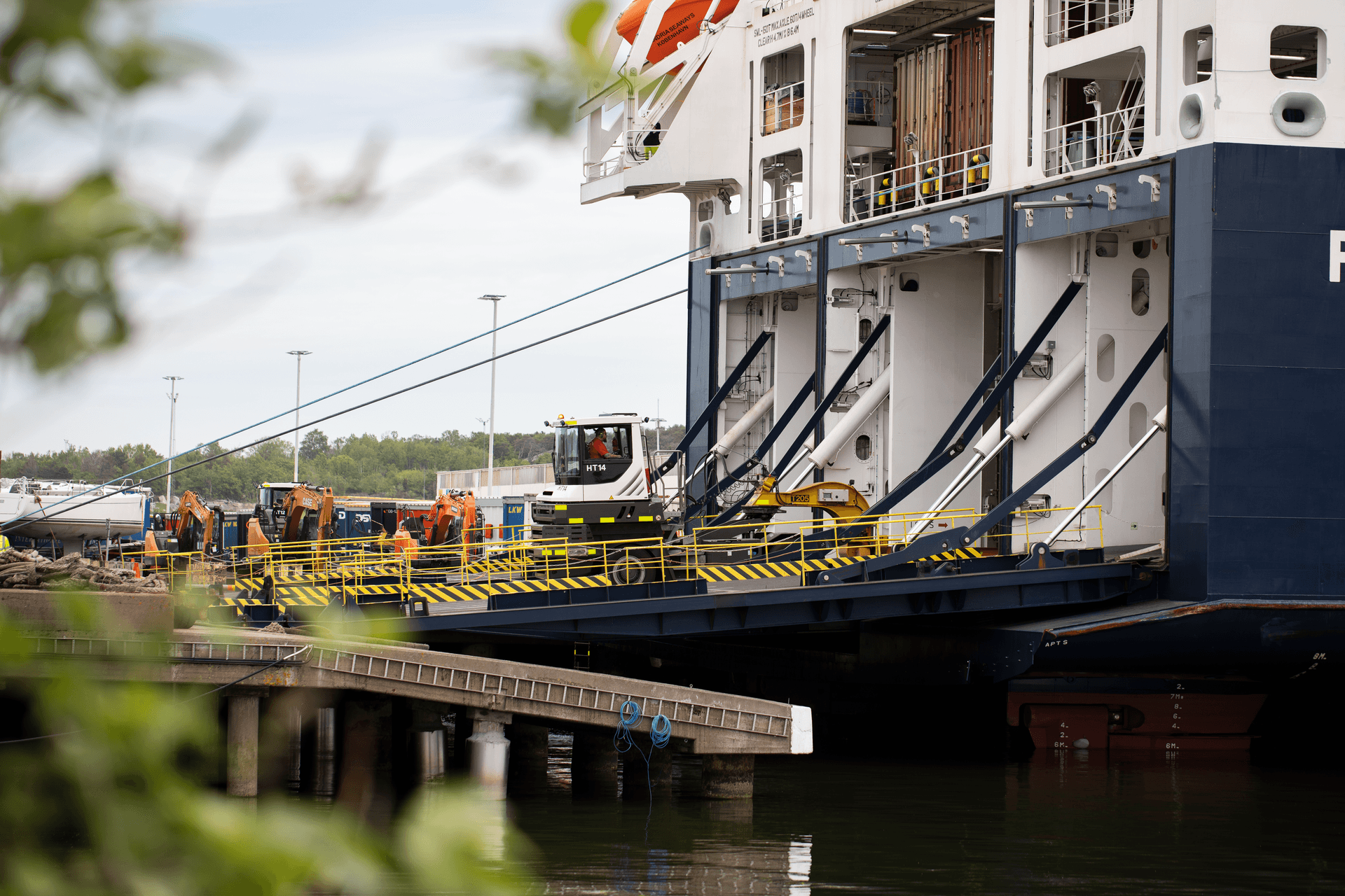 Tug master without a trailer seeing embarking on a vessel in the harbour