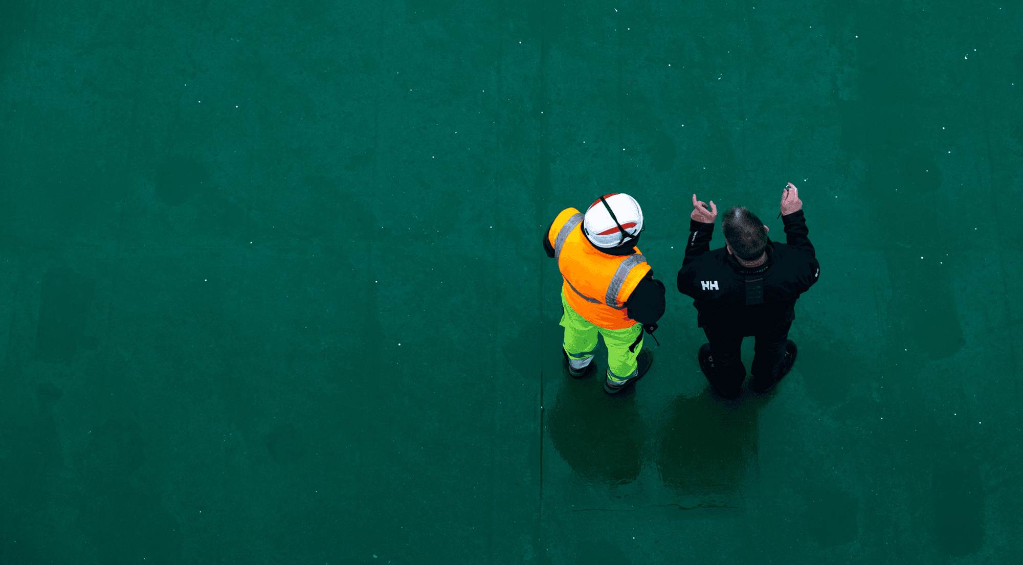 DFDS two men on green surface
