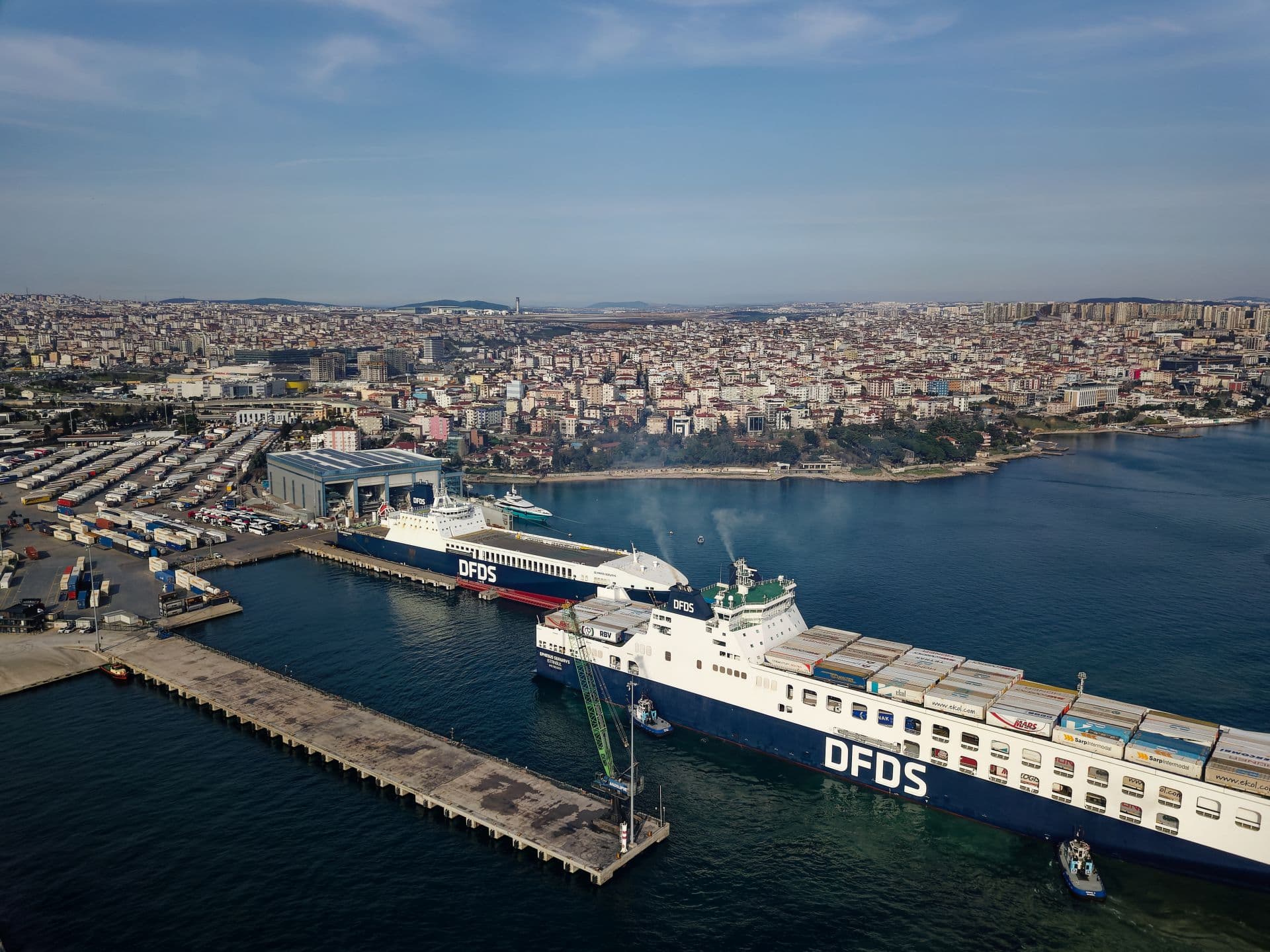 Two DFDS vessels in the harbour of Istanbul, Türkiye, with in the background the city scenery