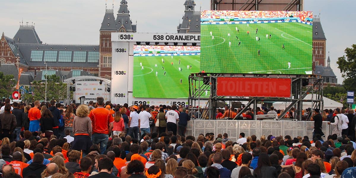 People watching football game in Amsterdam